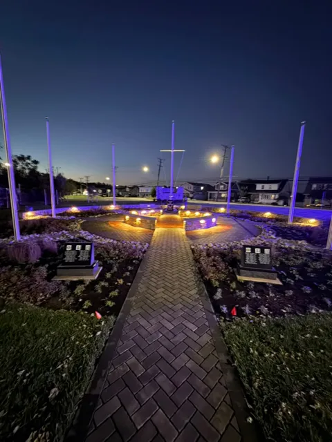 Memorial park walkways lit at night