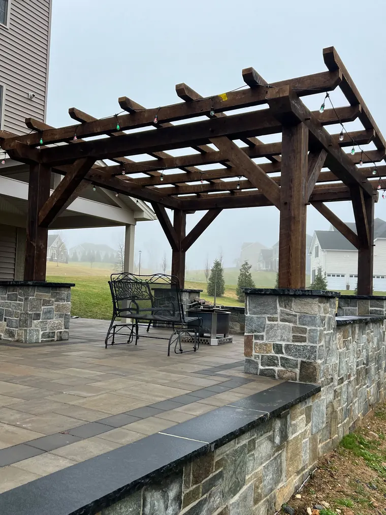 Timber pergola on stone clad columns