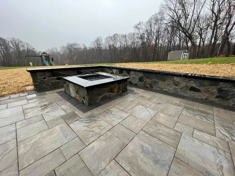 Fire pit built into wall