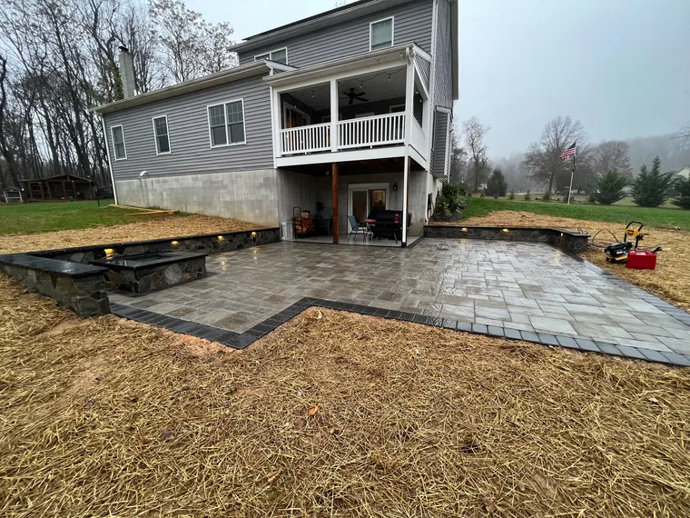 Patio with fire pit in open yard