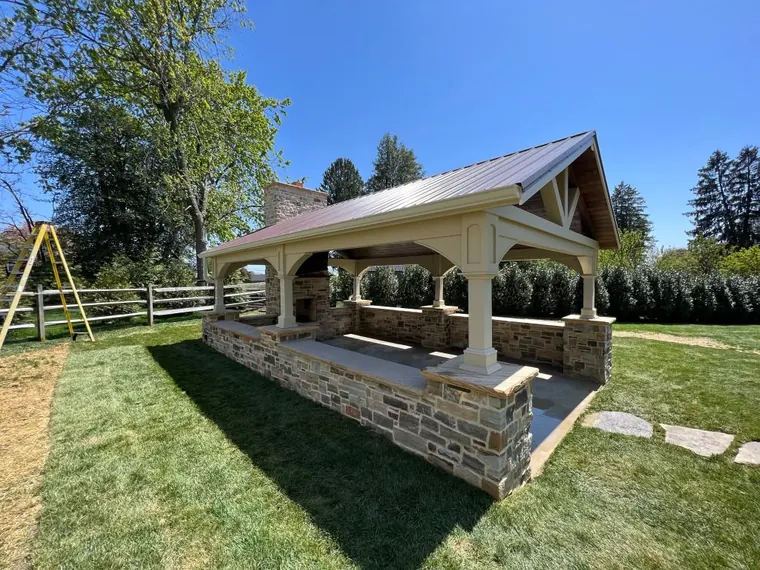 Gable pavilion in open field