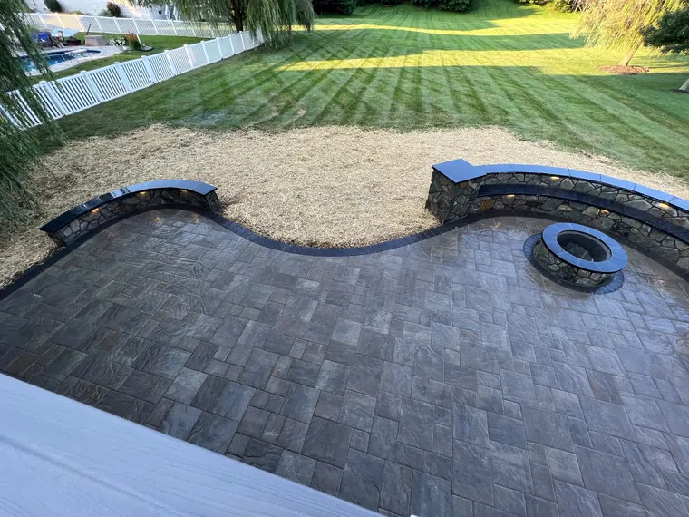 Curved seat wall with fire pit