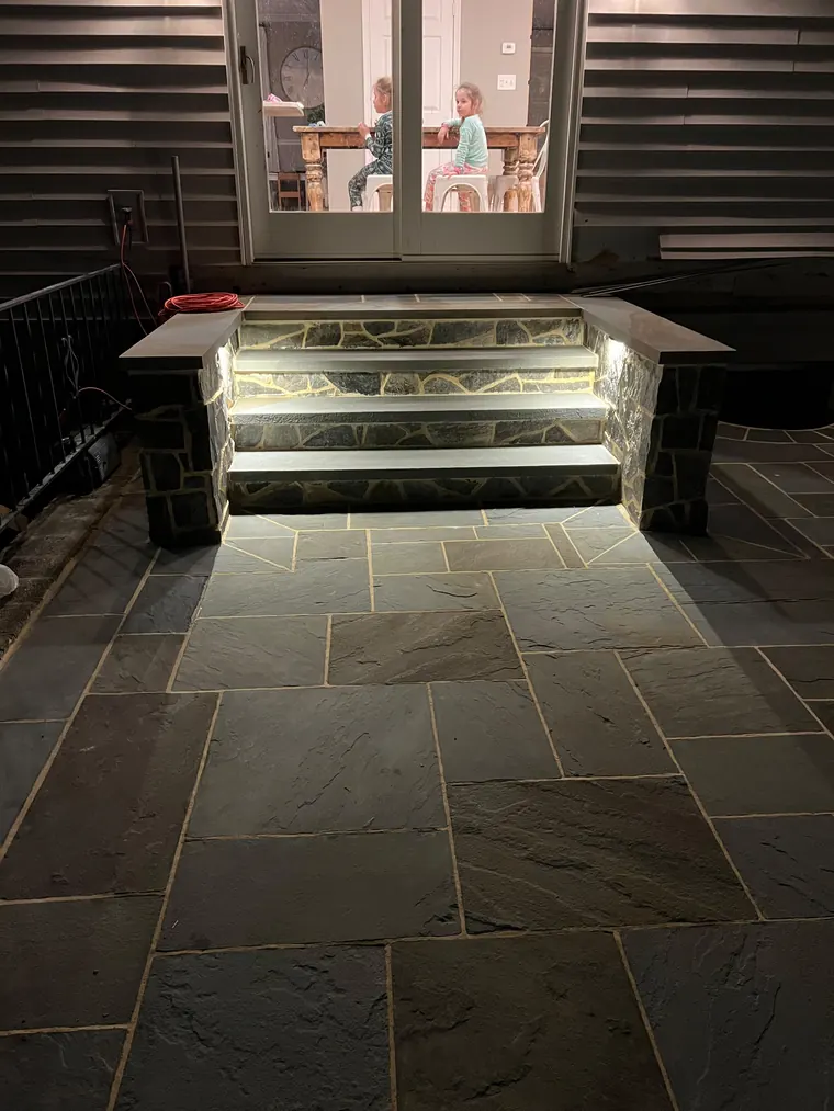 Stone bar lit at night